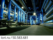 Pipes, tubes, machinery and steam turbine at a power plant                 . Стоковое фото, агентство Ingram Publishing / Фотобанк Лори
