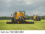 Agricultural machinery in agricultural fair. Стоковое фото, агентство Ingram Publishing / Фотобанк Лори