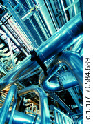 Pipes, tubes, machinery and steam turbine at a power plant                 . Стоковое фото, агентство Ingram Publishing / Фотобанк Лори