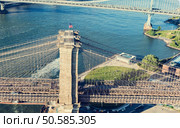 Brooklyn Bridge over the East River in New York City. Brooklyn Bridge over the East River in New York. Стоковое фото, агентство Ingram Publishing / Фотобанк Лори