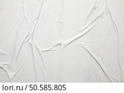 white crumpled and creased glued wrinkled paper poster texture background. Стоковое фото, агентство Ingram Publishing / Фотобанк Лори