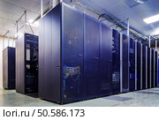 room with rows of server hardware in the data center. Стоковое фото, агентство Ingram Publishing / Фотобанк Лори