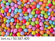 Sweet round multicolor candies spreading  on background. Стоковое фото, агентство Ingram Publishing / Фотобанк Лори