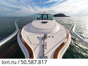 Sailing boat deck with hoisted sails and teak deck. Стоковое фото, агентство Ingram Publishing / Фотобанк Лори