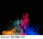 Freeze motion of colored dust explosion isolated on black background. colored dust explosion on black background. Стоковое фото, агентство Ingram Publishing / Фотобанк Лори