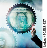 Businessman touching cog wheel with US Dollar in center. 24316769. Стоковое фото, агентство Ingram Publishing / Фотобанк Лори