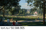 People enjoy a sunny afternoon in a large park with lush greenery and a gazebo in the background filled with families and friends relaxing. Стоковое AI-изображение, AI-художник Сергей Толмачёв / Фотобанк Лори