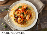 Homemade Shrimp and Grits with Pork and Cheddar. Стоковое фото, агентство Ingram Publishing / Фотобанк Лори