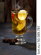 glass of hot apple tea with spices, closeup. Стоковое фото, агентство Ingram Publishing / Фотобанк Лори