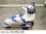 Moscow, Russia - March 1, 2025: The exhibition of the famous Russian brand Gzhel is the production of tableware and other ceramic products. Редакционное фото, фотограф Татьяна Васильева / Фотобанк Лори