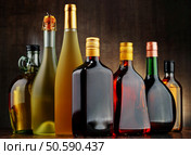 Composition with bottles of assorted alcoholic beverages. Стоковое фото, агентство Ingram Publishing / Фотобанк Лори