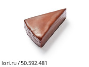Moist and creamy chocolate flavoured cake slice isolated on white background. Bakery and patisserie concept. Moist and creamy chocolate flavoured cake slice isolated on white background. Стоковое фото, агентство Ingram Publishing / Фотобанк Лори