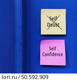 Pink and yellow notes on blue background with text SELF DOUBT - SELF CONFIDENCE, concept of to overcome SELF DOUBT from keeping you struck, get out of fear and regaining self-confidence. Pink,And,Yellow,Notes,On,Blue,Background,With,Text,Self. Стоковое фото, агентство Ingram Publishing / Фотобанк Лори