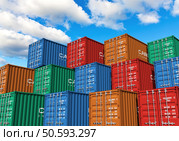 Stacked cargo containers in storage area of freight sea port terminal. Стоковое фото, агентство Ingram Publishing / Фотобанк Лори