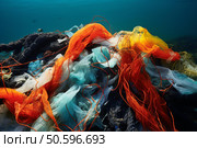 Colorful plastic fishing nets polluting the ocean floor. Стоковое AI-изображение, AI-художник Иван Рябоконь / Фотобанк Лори
