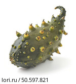 Kiwano fruit with horned rind resting on white background. Стоковое AI-изображение, AI-художник Иван Рябоконь / Фотобанк Лори