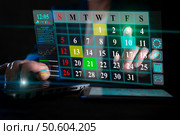 Digital calendar interface used for scheduling tasks on a laptop during evening hours. Стоковое фото, фотограф Климов Денис / Фотобанк Лори