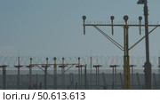 Landing beacon and landing lights blinking. Стоковое видео, видеограф Михаил Коханчиков / Фотобанк Лори