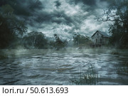 Flooded house during heavy rain and storm surge with dark clouds. Стоковое AI-изображение, AI-художник Иван Рябоконь / Фотобанк Лори