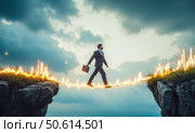 Businessman walking on burning fiery stock market graph, this concept is for high-risk trading and extremely volatile financial markets. Стоковое AI-изображение, AI-художник Павел Муравьев / Фотобанк Лори