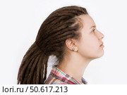 Young woman with hair braided in dreadlocks. Стоковое фото, фотограф Дмитрий Киселёв / Фотобанк Лори
