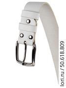 White leather belt with metal buckle beautifully curved close-up isolated on a white background. Стоковое фото, фотограф Лазаренко Светлана / Фотобанк Лори