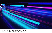 Colorful light trails converging in dynamic motion blur effect. Стоковое AI-изображение, AI-художник Юрий Поздников / Фотобанк Лори