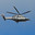 Вертолет AgustaWestland AW139 (RA-01697) ООО «Авиакомпания “Северо-Запад”» летит на фоне голубого неба с небольшой облачностью в Сочи (2021 год). Редакционное фото, фотограф Екатерина Лызлова / Фотобанк Лори