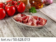 Italian Cured pork neck slices. Стоковое фото, фотограф Андрей Старостин / Фотобанк Лори
