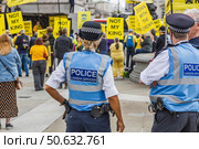 UK Police Liaison Officers Monitoring Peaceful Protest. London, UK, 5 May 2024. Редакционное фото, фотограф Zydrius Tartenis / Фотобанк Лори