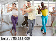 European guy with team of like-minded multinational people learn to elements of hip hop dance. Стоковое фото, фотограф Яков Филимонов / Фотобанк Лори