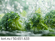 Fresh broccoli florets being washed under running water, promoting healthy eating habits. Стоковое AI-изображение, AI-художник Иван Рябоконь / Фотобанк Лори