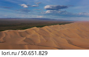 Aerial view of sand dunes in desert at sunset. Стоковое фото, фотограф Михаил Коханчиков / Фотобанк Лори