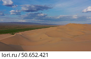 Aerial view of sand dunes in desert at sunset. Стоковое фото, фотограф Михаил Коханчиков / Фотобанк Лори