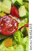 Salad of greens and tomatoes. The salad turns out to be fresh and healthy. Clockwise rotation. Стоковое видео, видеограф Ярославский Максим / Фотобанк Лори