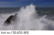High ocean waves breaking on the rocks. Стоковое фото, фотограф Михаил Коханчиков / Фотобанк Лори