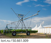 Круговая дождевальная машина Bauer . Сельскохозяйственная техника на выставке " Всероссийский День Поля 2025" в Волгоградской области. Редакционное фото, фотограф Тамара Селиванова / Фотобанк Лори
