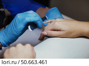Nail Filing Ritual at the Beauty Parlor, a Pampering Session. Стоковое фото, фотограф Aleksandr Golubev / Фотобанк Лори