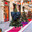 Stylish black bow on the Christmas tree. Beautiful Christmas background. Concept of preparing decorations and furnishings for the New Year. New Year's card 2026. Стоковое фото, фотограф Photojuli / Фотобанк Лори