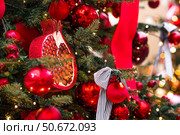 Magical Christmas background. Concept of preparation and decoration for the New Year. Holiday toys on the New Year's tree in Moscow. New Year's card 2026. Стоковое фото, фотограф Photojuli / Фотобанк Лори