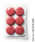 Vacuum-packed raw beef burger patties arranged in two neat rows, isolated on a white background, showcasing fresh texture and clean food packaging for commercial use. Стоковое AI-изображение, AI-художник Катерина Бондарец / Фотобанк Лори