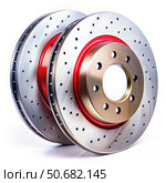 Two Perforated Brake Discs With Red Accents on a White Background. Generative AI. Стоковое AI-изображение, AI-художник Roman Zavorotny / Фотобанк Лори