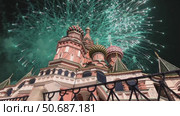 Temple of Basil the Blessed and fireworks in honor of Victory Day celebration (WWII), Red Square, Moscow, Russia. with zoom. Стоковое видео, видеограф Владимир Журавлев / Фотобанк Лори