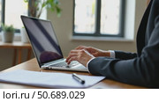 Businesswoman typing e-mail on laptop at office desk, composing professional email letter using business etiquette, writing e message to corporate client online, focus on screen, modern messenger. Стоковое AI-видео, аниматор Sergey Grishin / Фотобанк Лори
