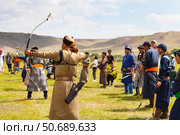 ELANTSY VILLAGE, IRKUTSK REGION, RUSSIA - July 5, 2025: Erdyn Games - festival of nomadic peoples of Eurasia, archery competitions in national costumes near sacred Erd mountain on Baikal Lake coast. Редакционное фото, фотограф Виктория Катьянова / Фотобанк Лори