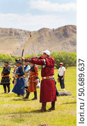 ELANTSY VILLAGE, IRKUTSK REGION, RUSSIA - July 5, 2025: Erdynskie Games - festival of nomadic peoples of Eurasia, archery competitions in national costumes at sacred Erd mountain on shore of Lake Baikal. Редакционное фото, фотограф Виктория Катьянова / Фотобанк Лори