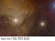 Messier 4 and NGC 6144 globular clusters with Antares, a red supergiant star. Стоковое фото, фотограф Alan Dyer/Stocktrek Images / ТАСС / Фотобанк Лори