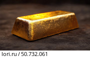 metallic gold ingot. Стоковое фото, фотограф Vectorwin / Фотобанк Лори