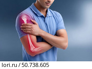 Man suffering from elbow and arm pain, highlighted skeleton. Стоковое AI-изображение, AI-художник Юрий Поздников / Фотобанк Лори