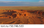 Bayanzag flaming cliffs at sunset in Mongolia. Стоковое фото, фотограф Михаил Коханчиков / Фотобанк Лори